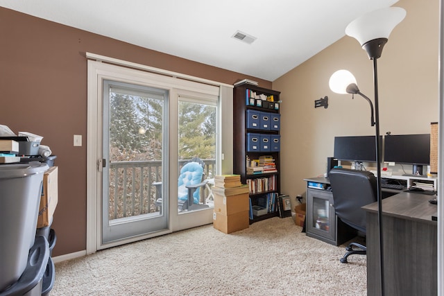 office featuring carpet and vaulted ceiling