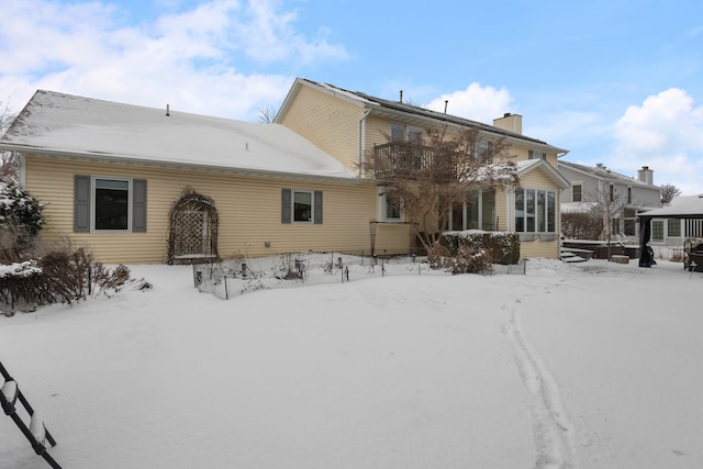 view of snow covered property