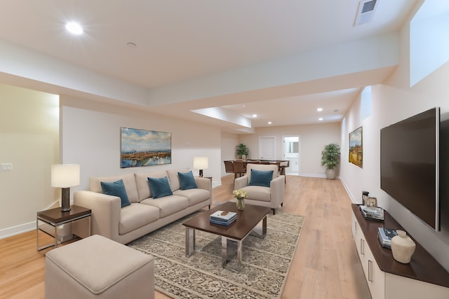 living room featuring light hardwood / wood-style floors