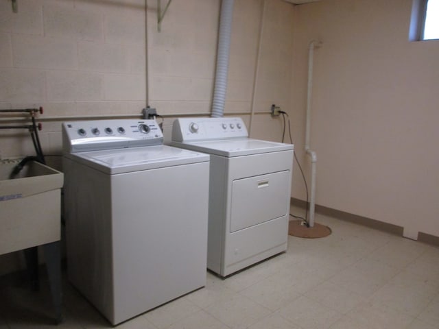 washroom featuring independent washer and dryer