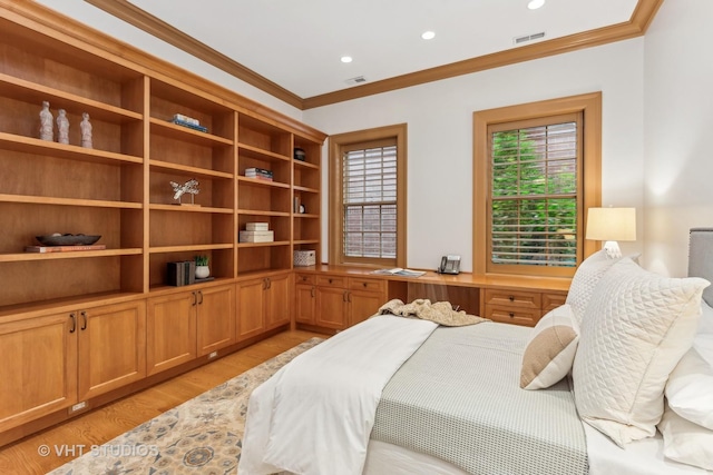 bedroom with light wood finished floors, recessed lighting, visible vents, and crown molding