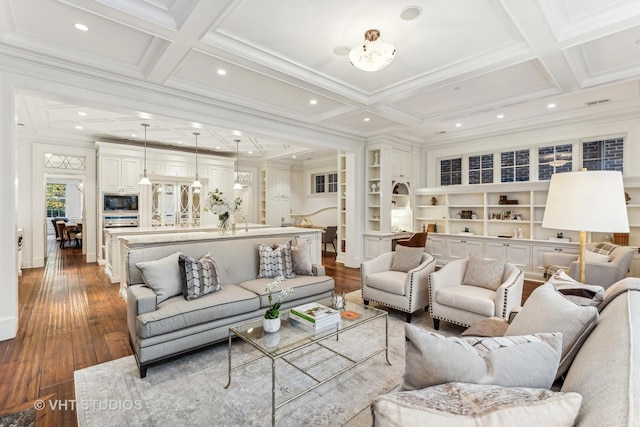 living room featuring crown molding, coffered ceiling, and dark wood finished floors