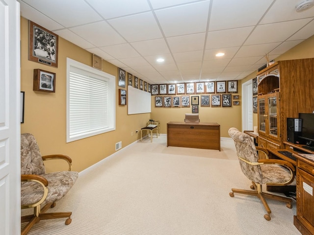 office featuring a paneled ceiling and carpet floors