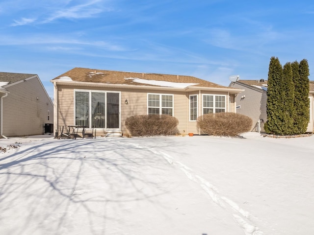 view of snow covered house