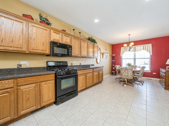 kitchen featuring decorative light fixtures, black appliances, light tile patterned flooring, and a notable chandelier