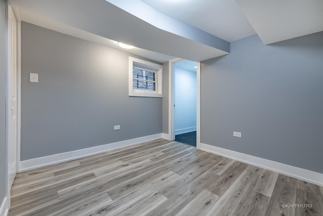 basement featuring light wood-type flooring