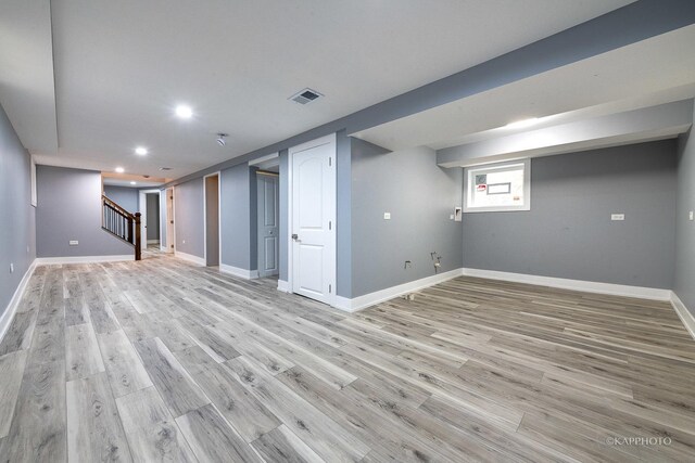 basement with light wood-type flooring