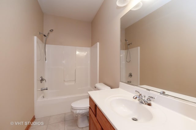 full bathroom featuring tile patterned flooring, vanity, bathing tub / shower combination, and toilet