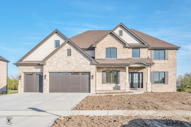 view of front of home with a garage