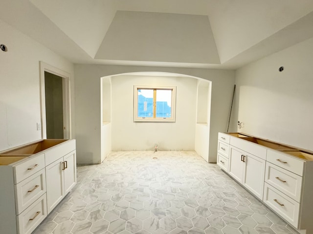 bathroom with vaulted ceiling