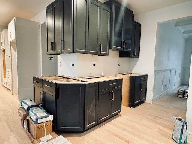 kitchen with light hardwood / wood-style flooring