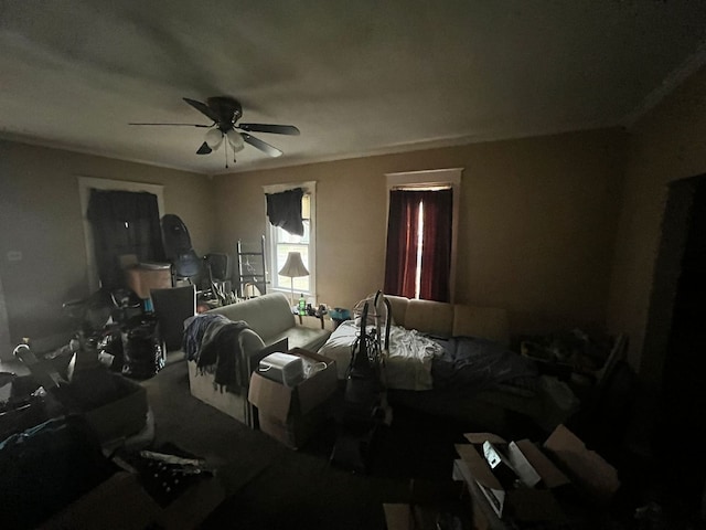 bedroom featuring ceiling fan and crown molding