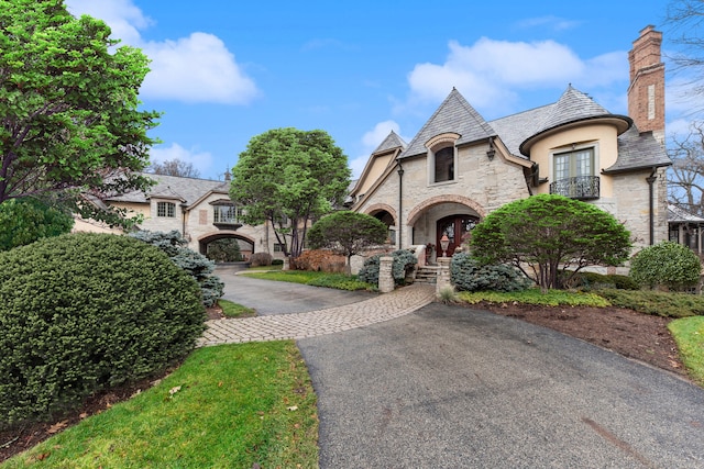 french country inspired facade featuring french doors