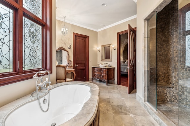 bathroom featuring separate shower and tub, vanity, a chandelier, and ornamental molding