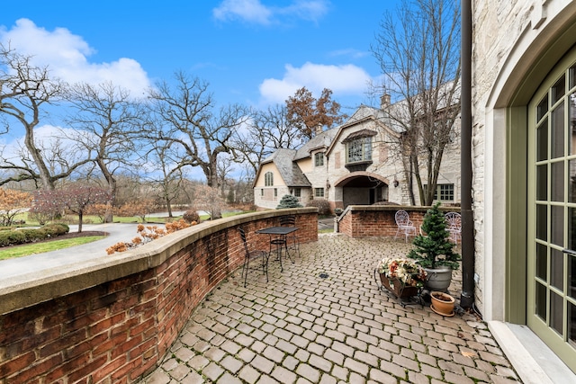 view of patio with exterior bar