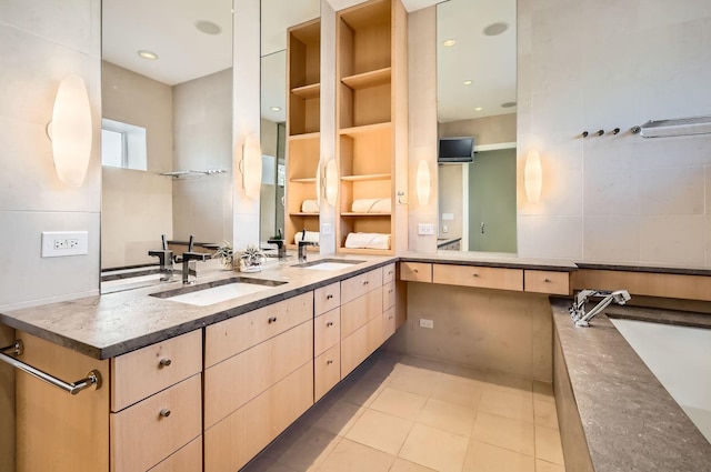 bathroom featuring vanity and tile patterned flooring