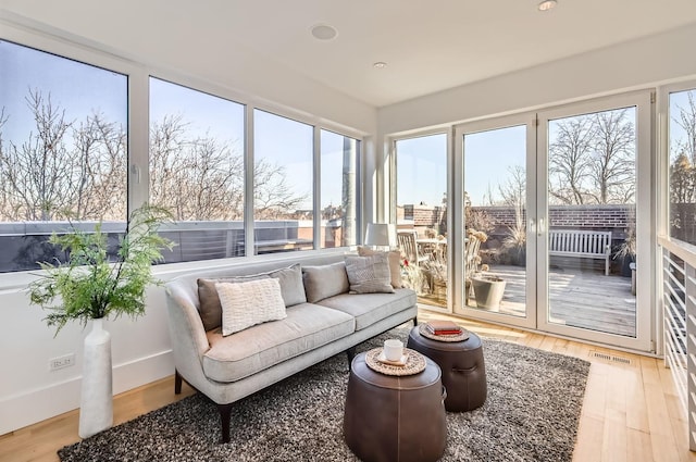 sunroom / solarium featuring a wealth of natural light