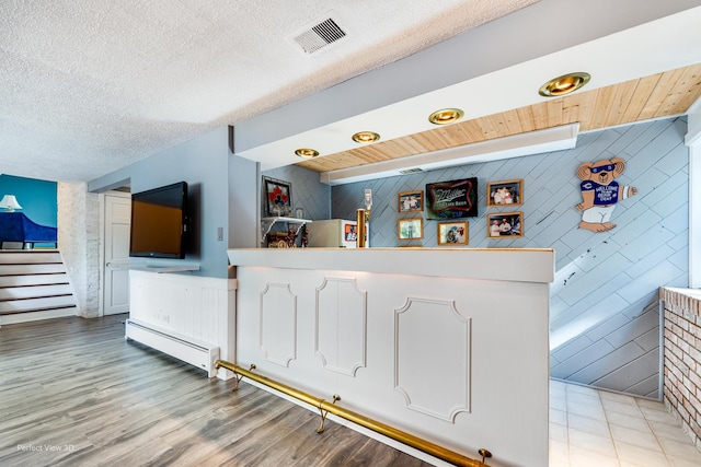 8542 W 132nd Pl, Palos Park, IL 60464 - welcome area with a textured ceiling, stairs, and wooden walls