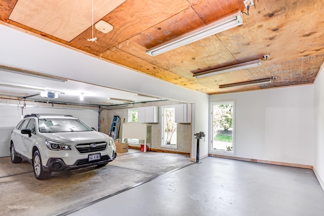 8542 W 132nd Pl, Palos Park, IL 60464 - garage with a garage door opener, baseboards, and wooden ceiling