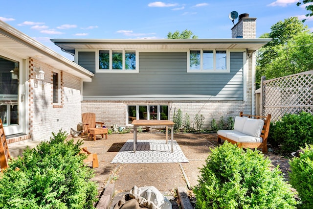 8542 W 132nd Pl, Palos Park, IL 60464 - back of house with a chimney, brick siding, and a patio