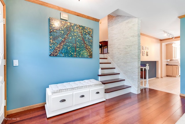 8542 W 132nd Pl, Palos Park, IL 60464 - staircase with crown molding, wood finished floors, baseboards, and rail lighting