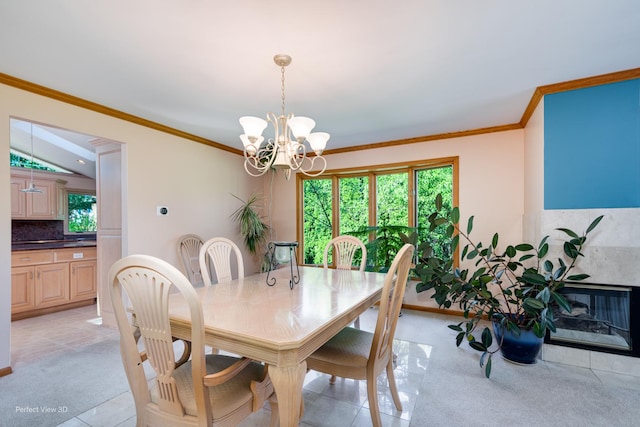 8542 W 132nd Pl, Palos Park, IL 60464 - dining area featuring a chandelier, crown molding, light carpet, baseboards, and light tile patterned floors