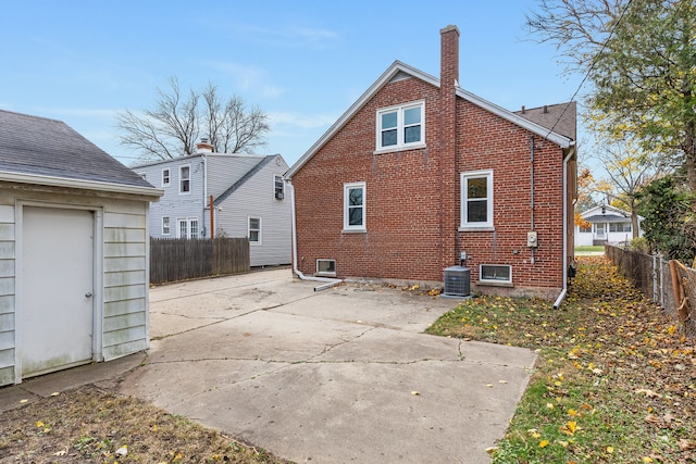 back of house featuring a patio and central AC unit