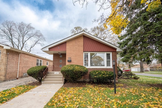 bungalow with a front lawn