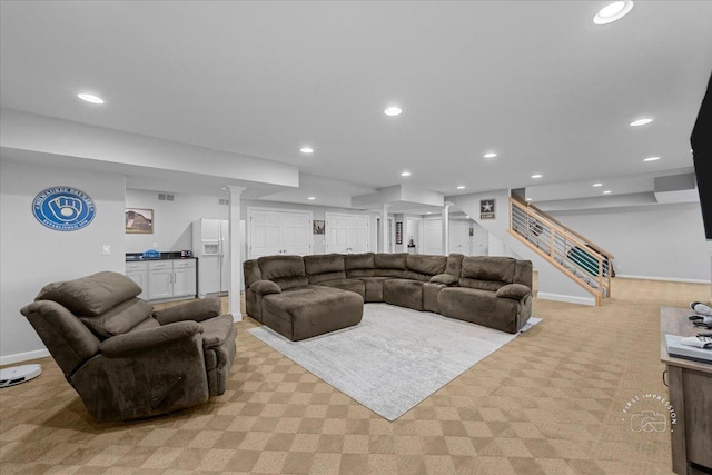 living room featuring light colored carpet