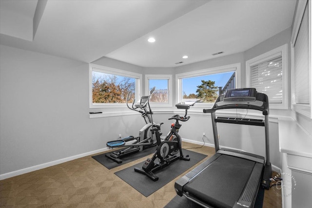 exercise room with carpet floors