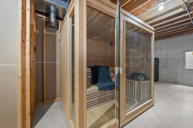 view of sauna with concrete flooring