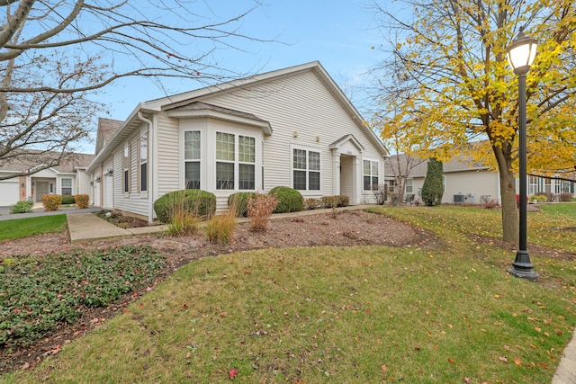 view of property exterior featuring a lawn