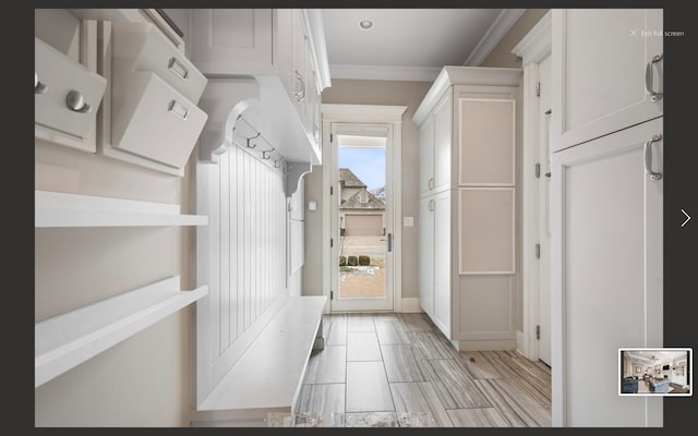 mudroom with crown molding