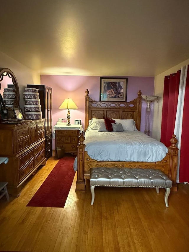 bedroom with light hardwood / wood-style flooring