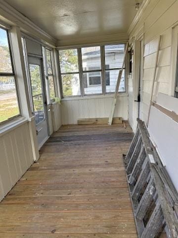 833 Hickory St, Waukegan, IL 60085 - unfurnished sunroom with hardwood / wood-style flooring and ornamental molding