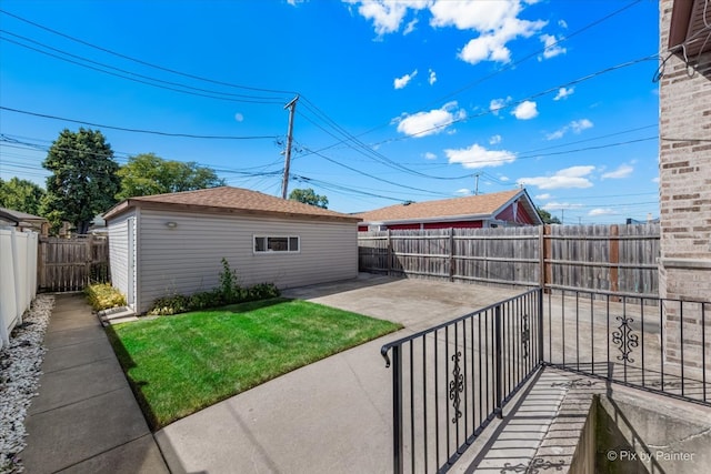 exterior space featuring an outbuilding and a patio