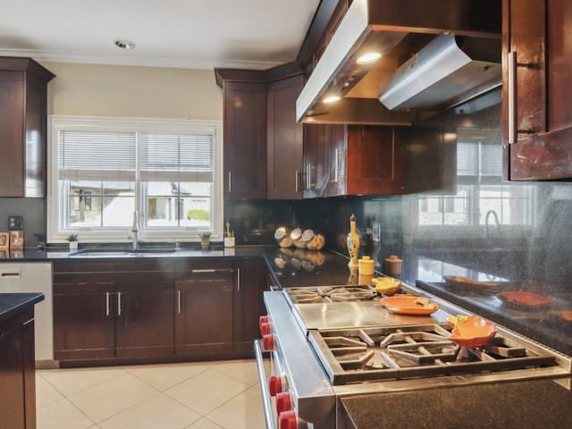 kitchen with sink, wall chimney exhaust hood, decorative backsplash, light tile patterned flooring, and white range with gas cooktop