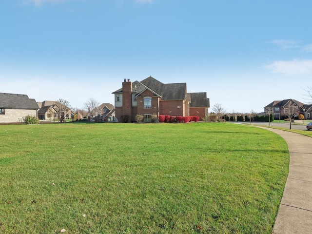 view of front of property with a front lawn