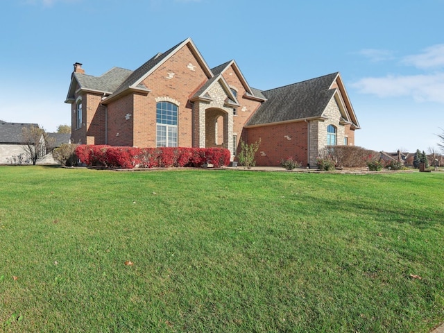 view of front of property with a front lawn