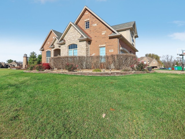 view of front of property with a front lawn