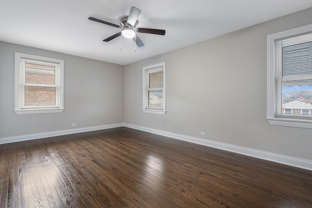 unfurnished room featuring dark hardwood / wood-style flooring and ceiling fan