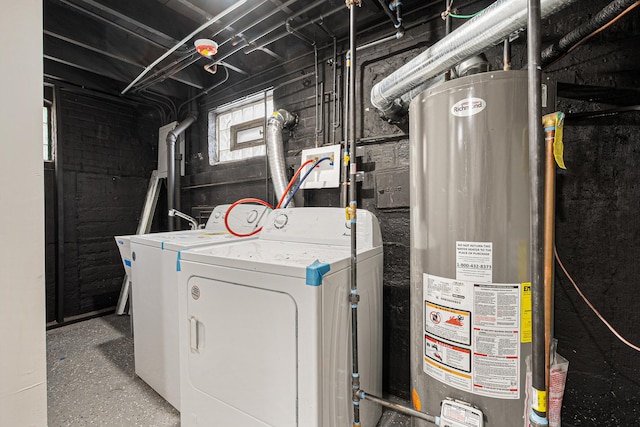 laundry area with separate washer and dryer and gas water heater