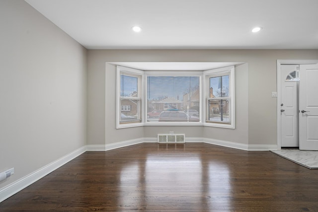 interior space with dark hardwood / wood-style flooring