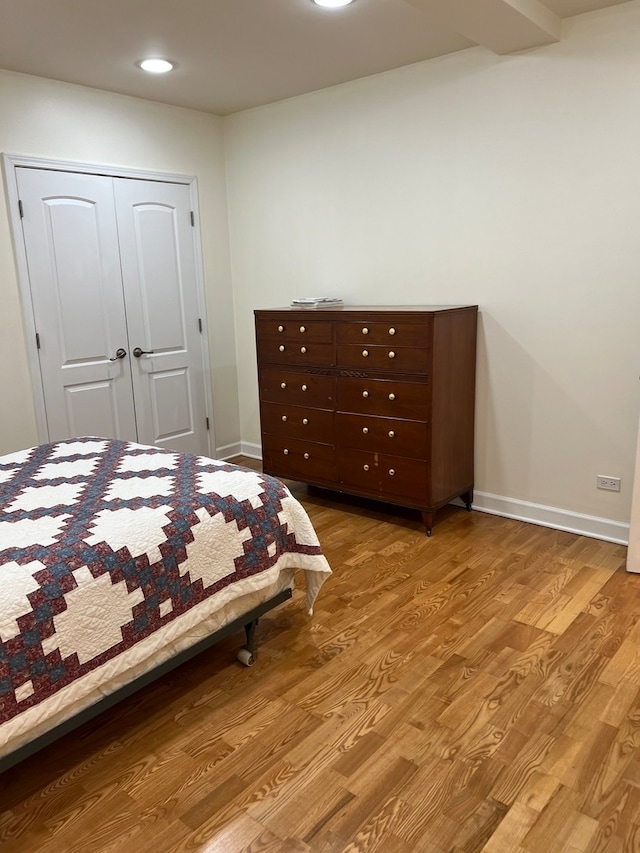 laundry area featuring light hardwood / wood-style flooring