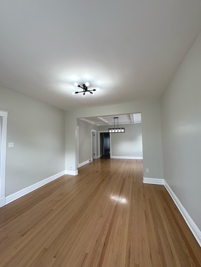 unfurnished living room with light wood-type flooring