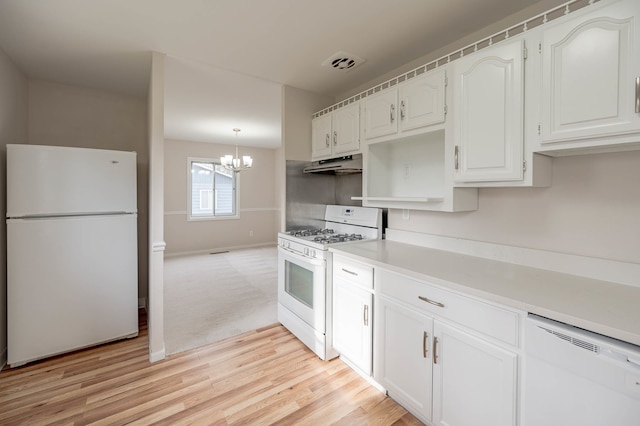 kitchen with white cabinets, white appliances, and light hardwood / wood-style flooring