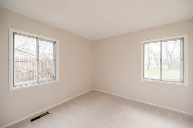 empty room with carpet flooring