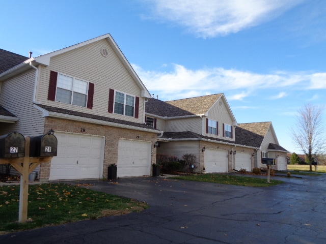 exterior space with a garage