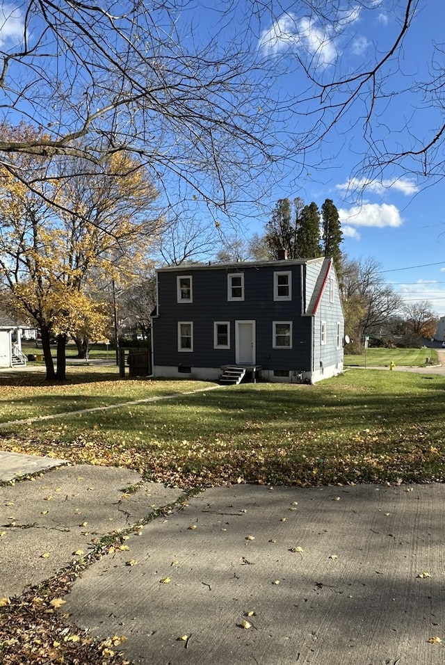 front of property with a front yard