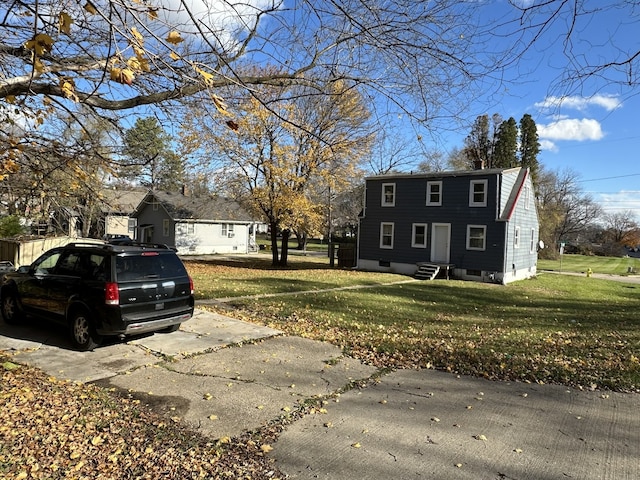 exterior space with a lawn